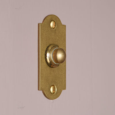 Aged Brass Arched Bell Push on lilac