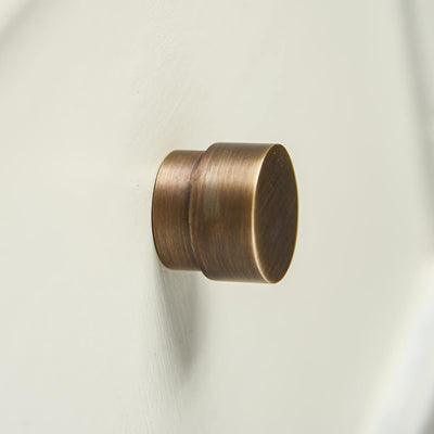 Cylinderical Cupboard knob in a brushed brass finish