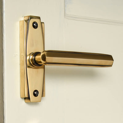 Polished Antique Brass Art Deco Lever Latch Door Handles showing deco detail