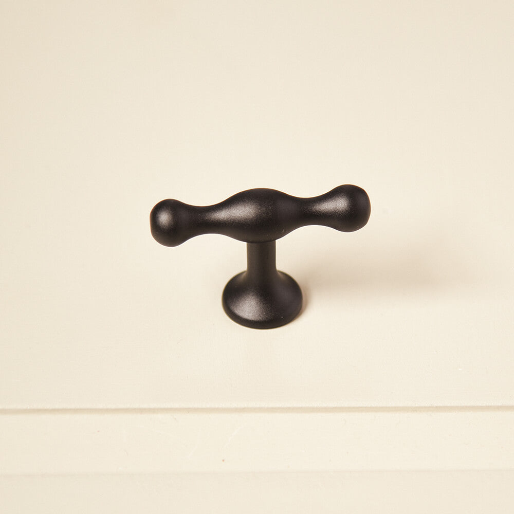 Black tap shaped pull handle