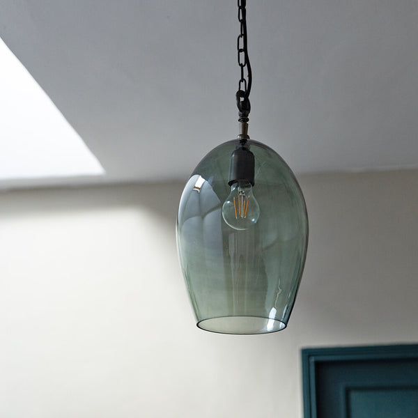 Green glass deals light pendant